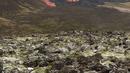 Lava yang mengalir dari gunung berapi Fagradalsfjall yang meletus sekitar 40 km sebelah barat ibu kota Islandia, Reykjavik, pada Sabtu (20/3/2021). Sebuah gunung berapi di dekat ibu kota Islandia meletus pada hari Jumat, 19 Maret. (Icelandic Coast Guard via AP)