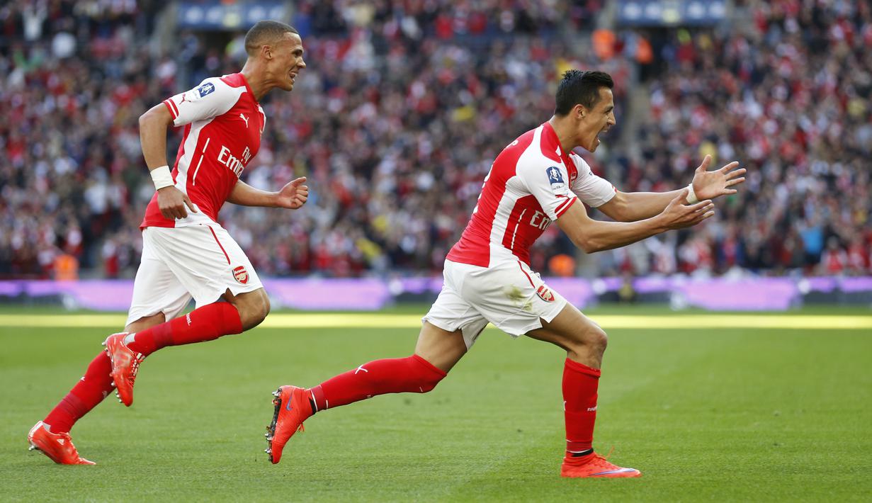 Selebrasi striker Alexis Sanches usai mencetak gol pembuka di menit ke-40