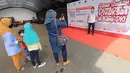 Karyawan saat vaksin di Sentra Vaksinasi Covid-19 di Bank DKI Kantor Layanan Juanda, Jakarta, Sabtu (10/7/2021). Vaksin bagi sektor perbankan juga membantu dalam pemulihan ekonomi nasional dak karyawan bank yang berada di front liner dalam pelayanan nasabah.  (Liputan6.com/HO/Nado)