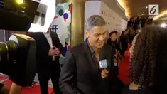 Aktor George Clooney punya cara tersendiri dalam memerangi korupsi di Afrika.