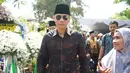 Agus Harimurti Yudhoyono tiba di rumah duka Presiden ke-3 RI BJ Habibie di Kuningan, Jakarta, Kamis (12/9/2019). Kedatangan SBY yang didampingi kedua anaknya, AHY dan Ibas, serta menantunya Annisa Pohan, untuk menyampaikan belasungkawa. (Liputan6.com/Immanuel Antonius)