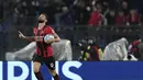 <p>Penyerang AC Milan, Olivier Giroud berselebrasi usai mencetak gol ke gawang Lazio pada pertandingan lanjutan Liga Serie A Italia di Stadion Olimpiade Roma, Italia, Senin (25/4/2022). Kemenangan ini mengantar AC Milan naik ke peringkat pertama dengan 74 poin. (AP Photo/Andrew Medichini)</p>