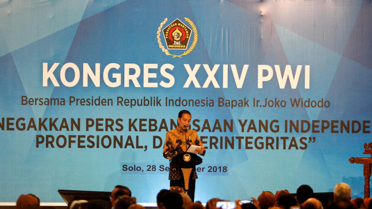 Presiden Jokowi menghadiri Kongres XXIV Persatuan Wartawan Indonesia (PWI) yang digelar di Solo, Jumat, 28 September 2018. (Liputan6.com/Fajar Abrori)