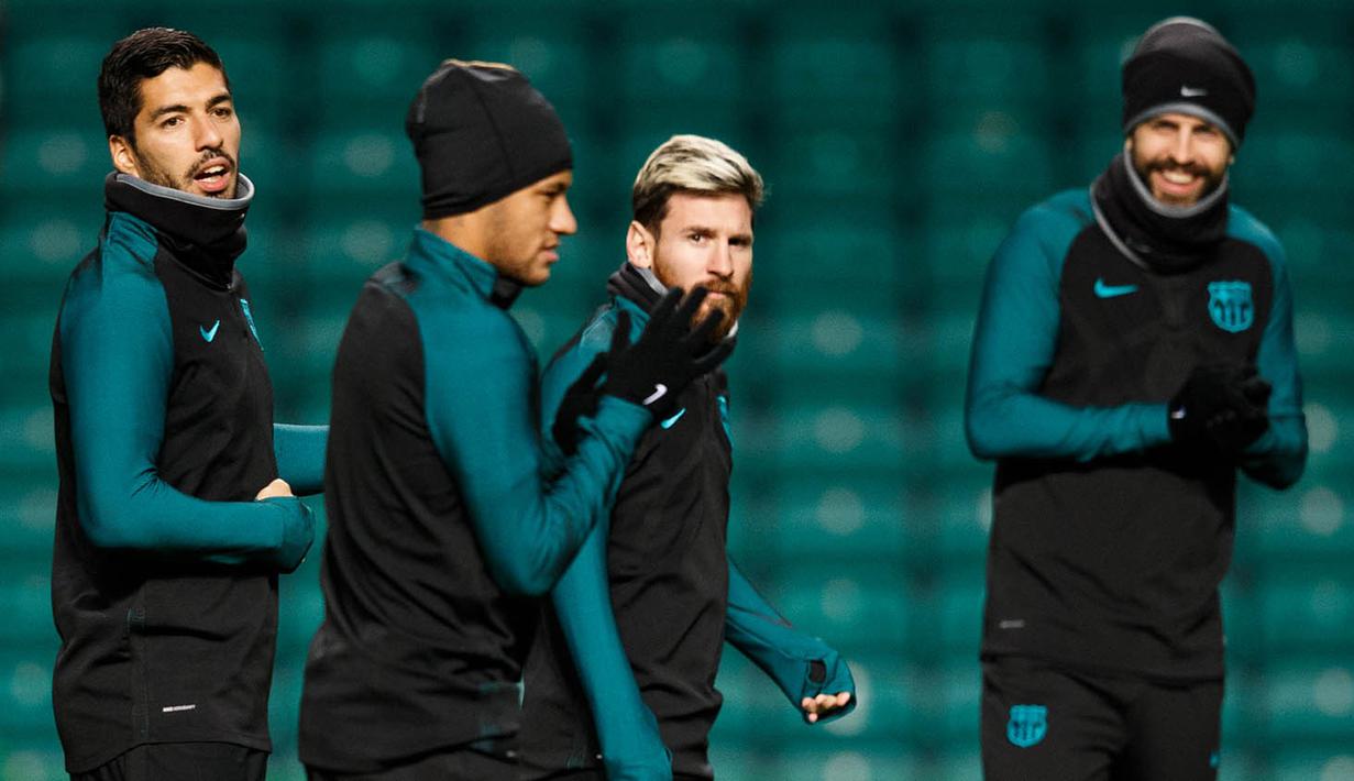 Bintang Barcelona, Lionel Messi, berlatih jelang laga Liga Champions melawan Celtic. Kembalinya Messi dipercaya akan membuat lini depan La Blaugrana kembali tajam. (EPA/Robert Perry) 