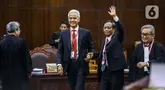 Pasangan Calon Presiden dan Calon Wakil Presiden nomor urut 3 Ganjar Pranowo-Mahfud Md datang ke ruang sidang Mahkamah Konstitusi (MK) di Jakarta, Rabu (27/3/2024). (Liputan6.com/Angga Yuniar)