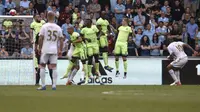 Andre Ayew cetak gol di Swansea City vs Manchester City (reuters)