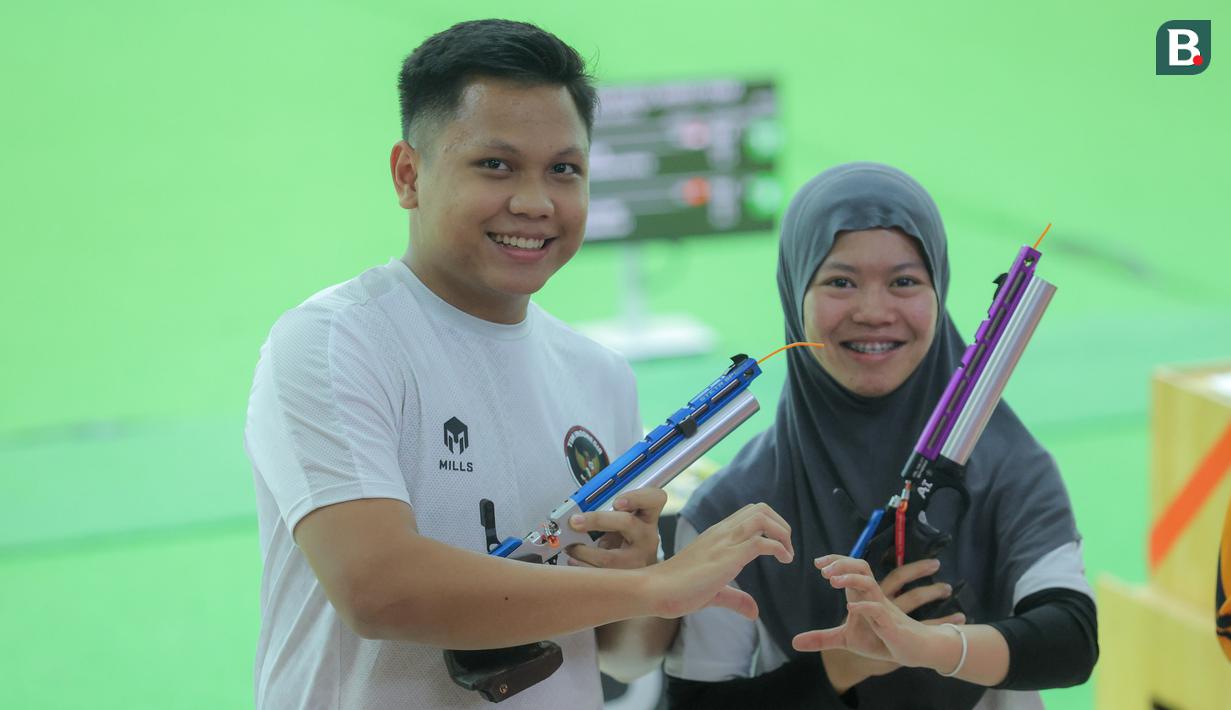 Berlaga di Shooting Racne Sports Authority of Thailand, Iqbal/Arista sukses berhasil membekuk wakil Vietnam, Trinh Thu Vinh/Pham Quang Huy, dengan skor 17-9. (Bola.com/Bagaskara Lazuardi)