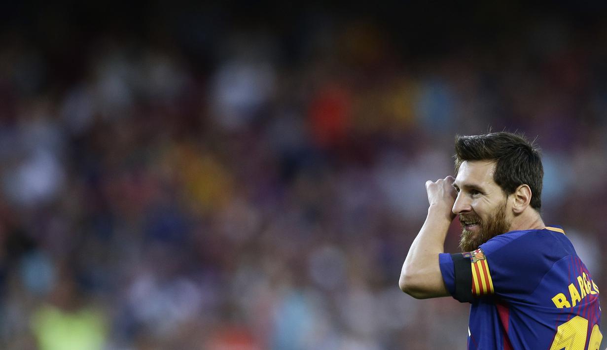 Ekspresi Lionel Messi, saat timnya melawan Real Betis pada laga La Liga Spanyol di Camp Nou stadium, Barcelona, (20/8/2017). Barcelona menang 2-0. (AP/Manu Fernandez)