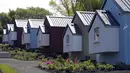 Desain rumah ala NestHouse pada peluncuran proyek Social Bite Village di Granton, Edinburgh di Skotlandia, 17 Mei 2018. Social Bite berencana membangun 10 rumah dengan biaya rendah dan lingkungan yang aman bagi 20 orang tunawisma. (AFP/Andy Buchanan)