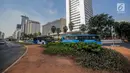 Kondisi jalur hijau setelah pembongkaran instalasi bambu Getah Getih di Bundaran HI, Jakarta, Kamis (18/7/2019). Masyarakat kini bisa melihat jelas Monumen Selamat Datang dari halte transjakarta Bundaran HI tanpa terhalang karya seni bernilai Rp550 juta itu. (Liputan6.com/Faizal Fanani)