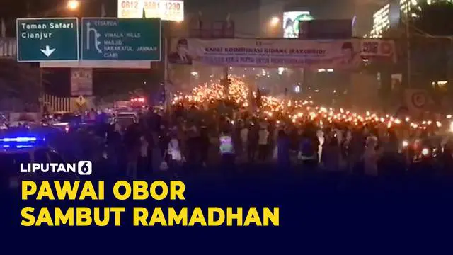 Ribuan warga kawasan Puncak Bogor antusias mengikuti pawai obor untuk sambut datangnya bulan suci ramadhan. Keramaian di jalan ini memicu macet panjang Rabu (30/3) malam.