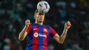 Pasukan Xavi Hernandez mengoleksi 20 poin dan berhak menggusur Girona. (AP Photo/Joan Monfort)