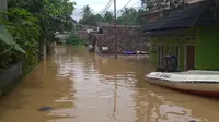 Lima hari pasca tsunami yang menerjang wilayah Banten, mengakibatkan banjir besar di Desa Teluk, Kecamatan Labuan (Merdeka.com/Nur Habibie)