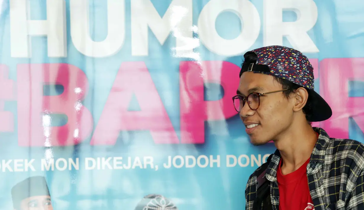 "Ini film pertama, gue dikasih kepercayaan juga akhirnya di mana ada foto gue di posternya. Biasanya sih satu scene doang, sekarang banyak dan jadi pemeran utama," ucap Cemen berkunjung ke SCTV Tower, Senayan City, Rabu (14/9). (Deki Prayoga/Bintang.com)