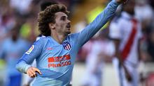 Striker Atletico Madrid, Antoine Griezmann, merayakan gol yang dicetak ke gawang Rayo Vallecano pada pekan ke-24 La Liga 2018-2019 di Estadio de Vallecas, Sabtu (16/2/2019) waktu setempat. (OSCAR DEL POZO / AFP)