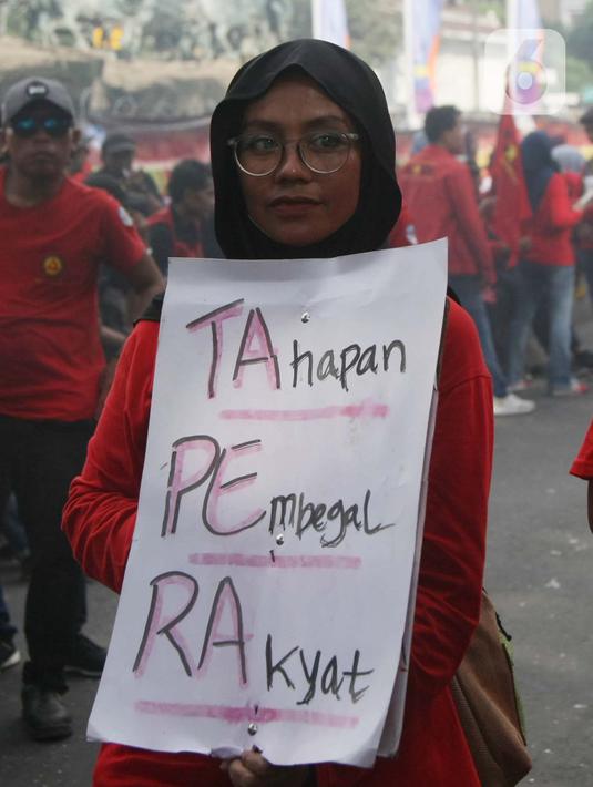 Pengunjuk rasa menilai Tapera merupakan perampokan uang rakyat dengan gaya baru. (Liputan6.com/Angga Yuniar)