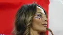 Seorang suporter wanita Kosta Rika dengan wajah dicat bersorak sebelum pertandingan grup E Piala Dunia 2022 Qatar di Stadion Al Thumama di Doha, Qatar, Rabu 23 November 2022. Para suporter cantik Kosta Rika mencuri perhatian dan menambah semarak pertandingan dengan atribut yang dikenakannya. (AP Photo/Pavel Golovkin)