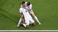 Pemain Inggris, Jude Bellingham, melakukan selebrasi setelah mencetak gol ke gawang Serbia pada laga Grup C Euro 2024 di Veltins Arena hari Senin (17/06/2024). (David Inderlied/dpa via AP)