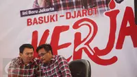 Cagub Basuki T Purnama dan Cawagub DKI Jakarta Djarot Saiful Hidayat berbincang saat acara kampanye rakyat di Rumah Lembang, Menteng, Jakarta Pusat, Senin (28/11). (Liputan6.com/Immanuel Antonius)