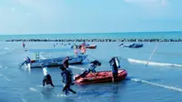 Atlet selam laut yang akan tampil pada Pekan Olahraga Nasional (PON) 2016 sudah mulai berlatih di Pantai Tirtamaya, Indramayu, Jawa Barat. Perlombaan cabang selam laut baru dimulai pada Rabu (21/9/2016). (Tim Media PON 2016).