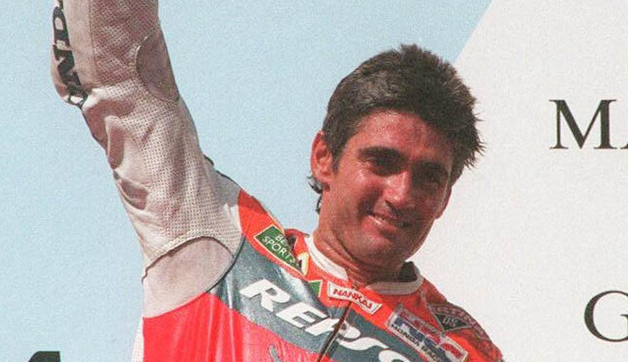 Pembalap legendaris asal Australia Mick Doohan menang di GP Indonesia 1996. Ketika itu Doohan mengalahkan Alex Barros dan Loris Capirossi di kelas 500cc atau MotoGP. (AFP/John Macdougal)