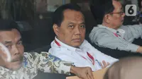 Direktur Operasional dan Pelayanan Publik Perum Bulog, Tri Wahyudi Saleh menunggu panggilan penyidik akan menjalani pemeriksaan di Gedung KPK, Jakarta, Selasa (17/12/2019). Tri Wahyudi  diperiksa sebagai saksi  terkait menerima suap pengelolahan Distribusi gula di PTPN III. (merdeka.com/Dwi Narwoko)