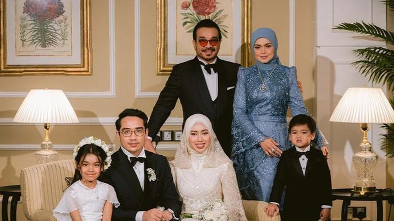 7 Potret Gaun Brokat Siti Nurhaliza di Pernikahan Anak Sambung, Detail Payet Memukau