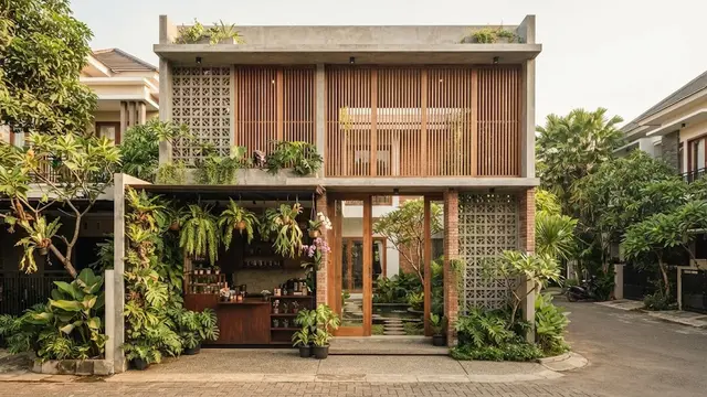 Desain Tropis Tempat Usaha dengan Fasad Hijau