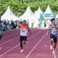 Sprinter Nusa Tenggara Barat Lalu Mohammad Zohri (195) mengikuti final lari 100 meter putri PON XX Papua di Stadion Atletik, Mimika SPort Complex, Rabu (6/10/2021). (Foto: PB PON XX PAPUA 2021/Rommy Pujianto)