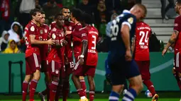 12-0. Kemenangan terbesar Bayern Munchen di musim 2021/2022 ini terjadi saat menang 12-0 atas tuan rumah Bremer SV di babak pertama DFB Pokal, 25 Agustus 2021. Dua bintang di laga itu adalah Eric Maxim Choupo-Moting yang mencetak hattrick dan Jamal Musiala dengan brace-nya. (AFP/Patrik Stollarz)