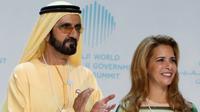 Sheikh Mohammed bin Rashid al-Maktoum, Wakil Presiden dan Perdana Menteri Uni Emirat Arab sekaligus penguasa Dubai, dan Putri Haya binti  Al-Hussein tampil bersama pada 2018 sebelum bercerai. (dok. KARIM SAHIB / AFP)