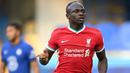 Sadio Mane direkrut oleh Roger Schmid untuk RB Salzburg pada tahun 2012, atas saran dari Ralf Rangnick yang saat itu menjabat sebagai Direktur Olahraga. Ia terus berkembang dan puncaknya saat berseragam Liverpool. Mane tercatat sudah mencetak 100 gol di Liga Inggris. (AFP/Michael Regan)