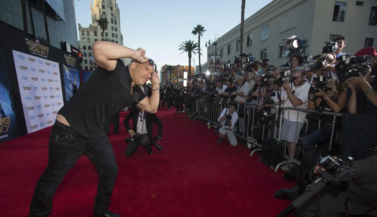 Aktor Vin Diesel berpose di red carpet acara premiere "Guardians Of The Galaxy" di  Hollywood, California, Selasa (22/7/14). (REUTERS/Mario Anzuoni)