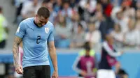 Ekspresi kesedihan bek Timnas Urugua, Jose Maria Gimenez saat melawan Prancis pada perempat final Piala Dunia 2018. (AP Photo/Ricardo Mazalan)