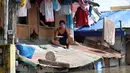 Badai Tropis Trami bergerak ke laut setelah menewaskan sedikitnya 40 orang. (ZALRIAN SAYAT/AFP)