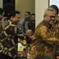 Ketua KPU Arief Budiman bersama Ketua Bawaslu Abhan saat tiba menghadiri rapat pleno Rekapitulasi Daftar Pemilih Tetap Hasil Perbaikan (DPTHP) di Kantor KPU RI, Jakarta, Minggu (16/9). (Merdeka.com/Iqbal S. Nugroho)