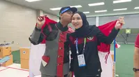 Atlet menembak Indonesia, Fathur Gustavian (kiri) dan Dewi Laila Mubarokah, yang sama-sama meraih medali emas di SEA Games 2021, di Hanoi, Vietnam. (NOC Indonesia)