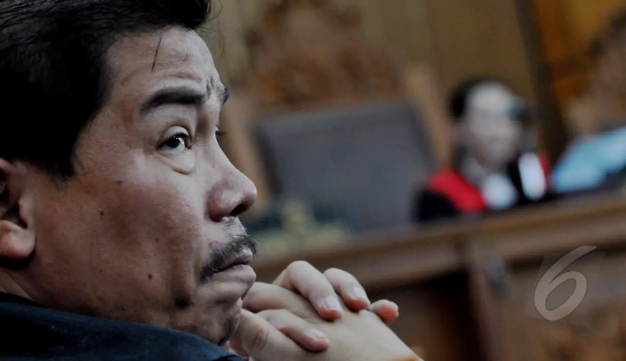 Jhonson Panjaitan menjadi pengacara Ilham Arief Sirajuddin dalam sidang putusan praperadilan di PN Jakarta Selatan, Selasa (12/05/2015). Hakim tunggal Upiek Kartikawati mengabulkan gugatan praperadilan tersebut. (Liputan6.com/Andrian M Tunay)