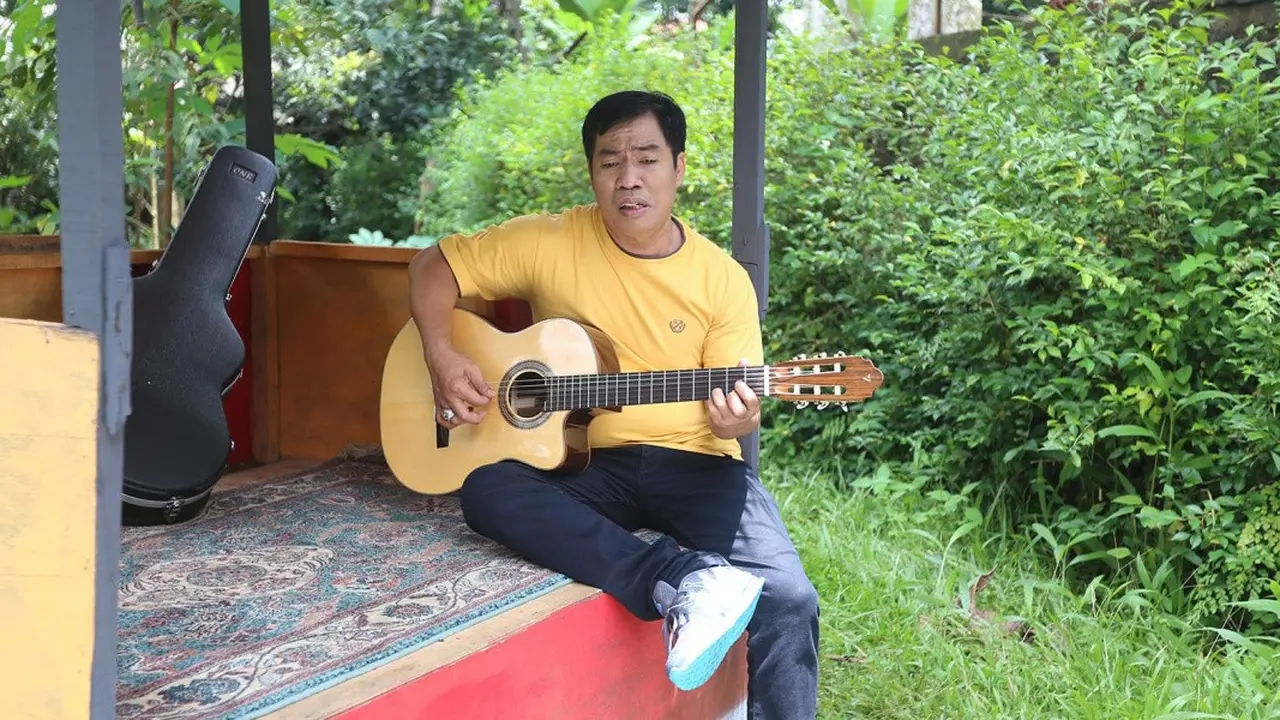 Temon main gitar