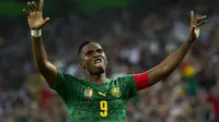 Eto'o saat merayakan gol ke gawang Jerman (JOHN MACDOUGALL / AFP)