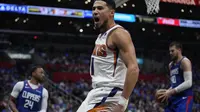 Selebrasi pemain Phoenix Suns Devin Booker saat melawan Clippers di play-off NBA 2023 (AP)