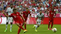 Thomas Mueller turut menyumbang sat gol ke gawang Bayer Leverkusen (REUTERS/Michaela Rehle )
