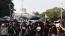 Sejumlah aktivis melakukan aksi kamisan di depan Istana Merdeka, Jakarta, Kamis (4/8). Aksi ini juga memberi dukungan buat Koordinator Kontras Haris Azhar yang dituduh melakukan pencemaran nama baik sejumlah lembaga. (Liputan6.com/Helmi Fithriansyah)