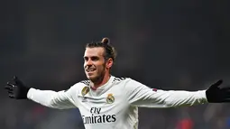 Meski masih mencetak tiga gol, Bale dirasa memiliki kontribusi lebih saat terciptanya banyak gol Madrid. MU membutuhkan Bale karena lini depan yang kurang cakap dan cepat saat menyerang. (AFP/Gabriel Bouys)