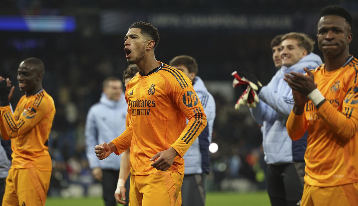 Pemain Real Madrid, Jude Bellingham merayakan kemenangan timnya atas Manchester City dalam laga leg 1 babak playoff Liga Champions 2024/2025 di Etihad Stadium, Manchester, Inggris, Rabu (12/02/2025) WIB. (AP Photo/Darren Staples)