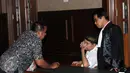 Panitera PTUN Medan, Syamsir Yusfan usai sidang vonis di Pengadilan Tipikor, Jakarta, Kamis (3/12/2015). Syamsir divonis tiga tahun penjara karena terbukti menerima suap sebanyak dua kali dengan total 2000 USD. (Liputan6.com/Helmi Afandi)