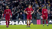 Reaksi kecewa pemain Liverpool setelah kalah 0-3 dari Wolverhampton pada laga pekan ke-22 Liga Inggris 2022/2023 di Molineux Stadium, Sabtu (04/02/2023). (AP via PA/Tim Goode)