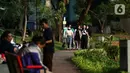 Warga bermain di Taman Situ Lembang, Menteng, Jakarta, Rabu (26/7/2023). (Liputan6.com/Angga Yuniar)