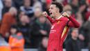 Selebrasi Curtis Jones usai mencetak gol kedua saat Liverpool membungkam Chelsea di pertandingan pekan ke delapan Premier League 2024/2025 di Anfield, Minggu (20/10/2024) malam WIB. (Jon Super/AP)
