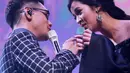 Afgan dan Raisa menggelar konser bertajuk 'An Evening Showcase with Afgan & Raisa', di Soehanna Hall, Energy Building, bilangan SCBD Sudirman, Jakarta, Senin (11/4/2016) malam. (Adrian Putra/Bintang.com)